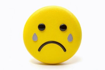 Fototapeta premium A solitary, downturned yellow face with tears and a frowning mouth, isolated on a white background, conveying a