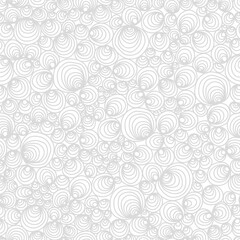 A seamless pattern of swirling shell-like shapes in a monochromatic design.