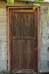 medieval wooden door in a stone wall