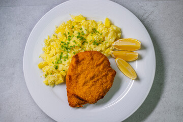 Chicken cutlet with couscous and lemon