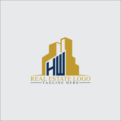 Modern HW Real Estate Logo Design with Building Silhouettes