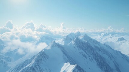 Naklejka premium A high-altitude view of a mountain range with snow-covered peaks and a clear, bright sky, with distant clouds on the horizon.