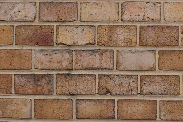 Old cracked brick wall showing deterioration from weathering in Vysehrad Prague