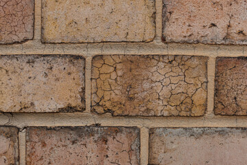 Old damaged cracked brick wall texture showing damage and age in Vysehrad Prague