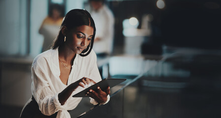 Night, tablet and update with woman in office for network, communication or administration....
