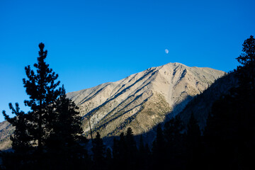 Views of tall jagged mountain peaks, large pine forests, rivers and streams, valleys and feilds, while backpacking through the John Muir Wilderness outside of Big Pine, CA.