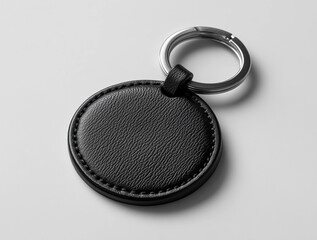 keychain mockup, a round black leather key chain