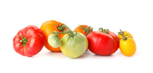 Different sorts of fresh ripe tomatoes isolated on white