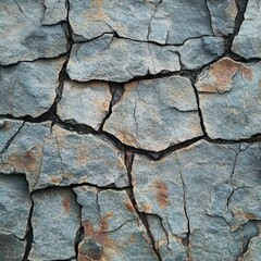 Obraz premium Cracked and Weathered Stone Surface with Rusty Patches