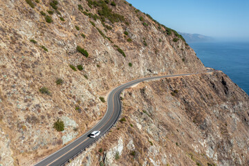 Beautiful landscape of Pacific Ocean coast along Highway 1 and Big Sur, aerial view, sunset, sunrise, fog. Concept, travel, vacation, weekend