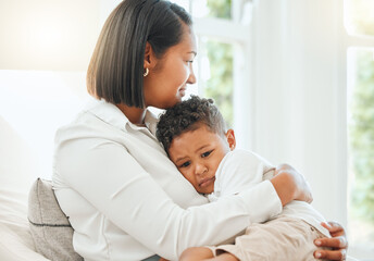 Obraz premium Sad, hug and comfort with mother and son for bullying, mental health and empathy together. Sympathy, compassion and self esteem with woman and child in family home for embrace, support and care
