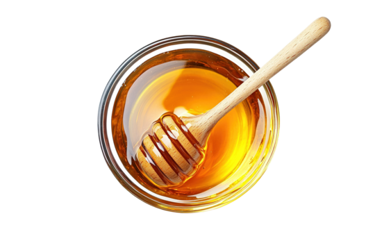 Glass bowl of pure honey with honey dipper isolated on a transparent background. cut out in PNG format for graphic design, isolated on a white background. top view.
