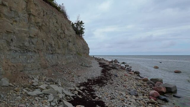 Aerial Video Panga Coastal Cliff and Lighthouse, Northern Shore of Saaremaa Island Near Kuressaare, Baltic Sea. Saaremaa, Estonia. 4K Panoramic Aerial Video of The Panga Cliffs