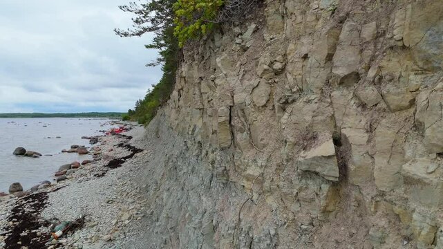 Aerial Video Panga Coastal Cliff and Lighthouse, Northern Shore of Saaremaa Island Near Kuressaare, Baltic Sea. Saaremaa, Estonia. 4K Panoramic Aerial Video of The Panga Cliffs