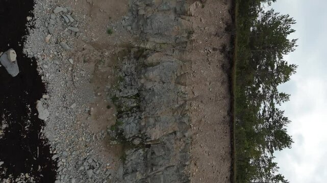 Aerial Video Panga Coastal Cliff and Lighthouse, Northern Shore of Saaremaa Island Near Kuressaare, Baltic Sea. Saaremaa, Estonia. 4K Panoramic Aerial Video of The Panga Cliffs