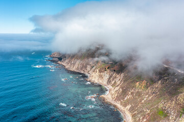 Beautiful landscape of Pacific Ocean coast along Highway 1 and Big Sur, aerial view, sunset, sunrise, fog. Concept, travel, vacation, weekend