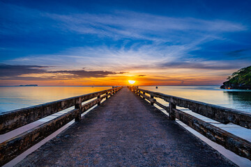 Fototapeta premium Sunrise view at the sea pier bridge