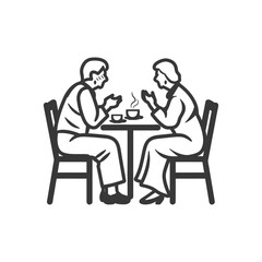 Two People Sitting at a Table Drinking Hot Beverages
