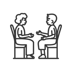 Two People Sitting Opposite Each Other in Chairs