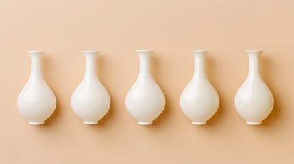 Five white milk bottles displayed on a minimalist background for food and beverage presentations