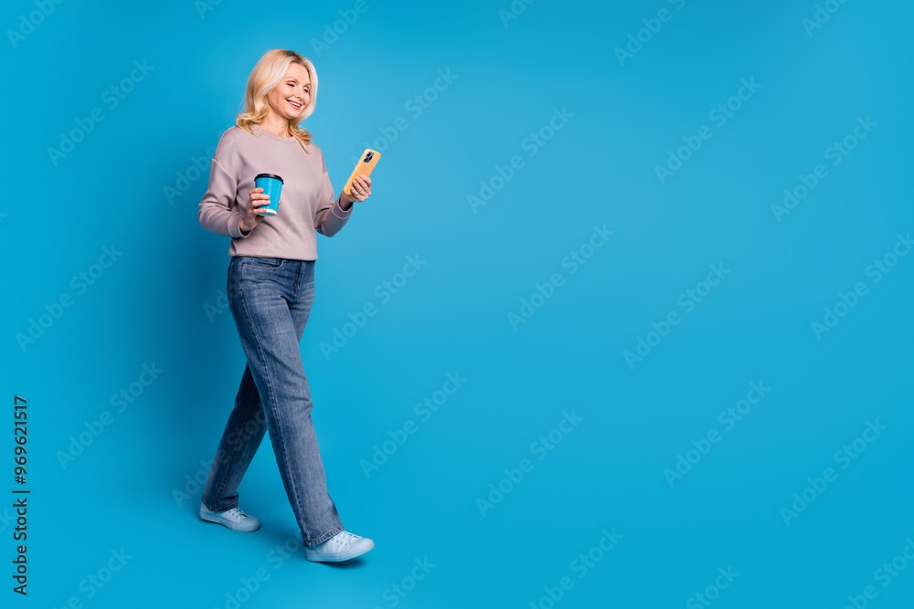 Sticker full body photo of lovely senior lady hold device coffee paper cup walk dressed stylish gray garment