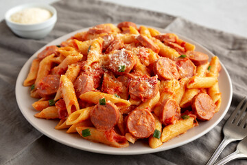 Homemade One-Pot Hot Dog Pasta on a Plate, side view.