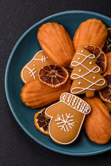 French classic madeleine sponge cake with elements of Christmas motifs