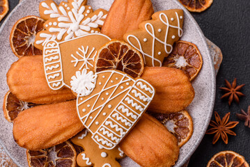 French classic madeleine sponge cake with elements of Christmas motifs