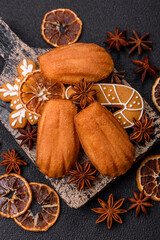 French classic madeleine sponge cake with elements of Christmas motifs