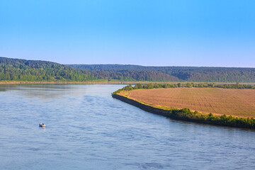 Landscape with a full-flowing river