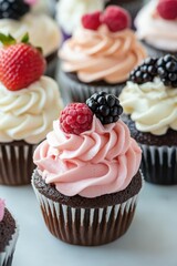 Delicious chocolate cupcakes with berry toppings at a dessert table