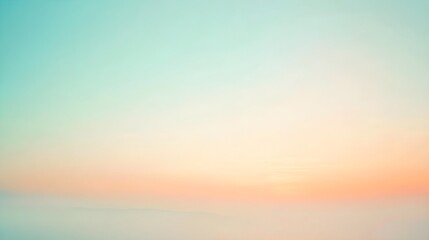 A softly blurred gradient transitioning from light blue to pale peach, creating a serene atmosphere against a light solid color background