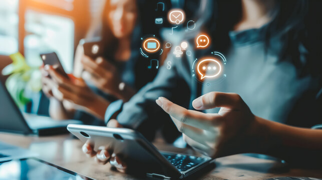 A woman utilizing omnichannel communication, seamlessly interacting across multiple platforms like phone, email, chat, and social media to enhance connectivity and customer engagement.