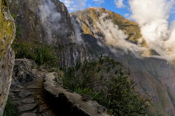 Scenic mountain path with clouds in the Andes.