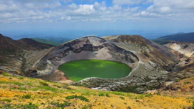 Scenic view of the volcanic crater lake Okama on the top of Mt. Zao in Japan