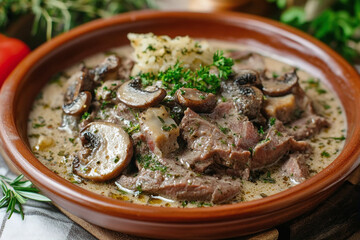 stewed meat with mushrooms and herbs