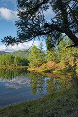 Russia, Western Buryatia. Early morning on the deserted taiga lake Guzen-Nur on the left bank of the Tisza River.