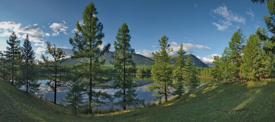 Russia, Western Buryatia. Early morning on the deserted taiga lake Guzen-Nur on the left bank of the Tisza River.