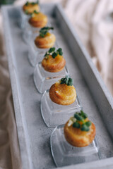 Elegant Miniature Savory Pastries on Tray