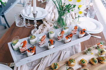 Elegant Layered Berry Desserts on Decorative Catering Table