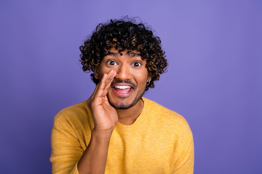 Photo of funky funny man wear stylish yellow clothes share tell say news isolated on violet color background