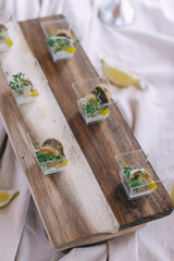 Elegant Appetizers on Wooden Serving Board