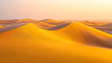 A captivating stock photo of undulating sand dunes in a vast desert landscape.