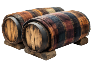 two barrels with blankets on them. 