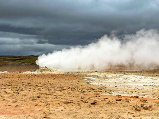 Hverir, Iceland - 24 August 2024: Steaming fumarole at the hot springs around the geothermal area of Hverir