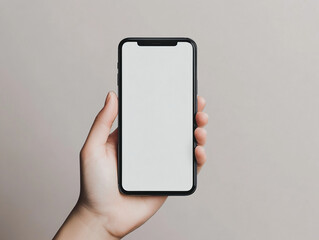 Hand holding a smartphone with blank screen mockup for mobile app presentation and UI UX design. 