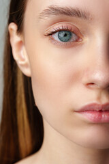 Obraz premium Close Up of Woman's Blue Eyes With Natural Makeup