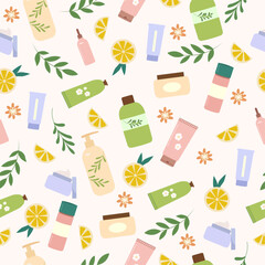 Hand drawn vector seamless pattern with natural and  organic cosmetics, cream, shampoo, essential oil. Skin and hair care products. Background with lemon pieces, flowers and leaves. Home spa backdrop