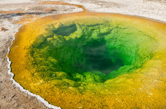 Vibrant aerial view of a geothermal pool in Yellowstone
