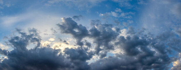 dramatic sky, dark clouds in blue sky after sunset